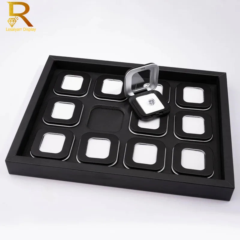 boîtes bijoux noir velours moderne diamants blanc rose vert fentes rectangulaires exposé