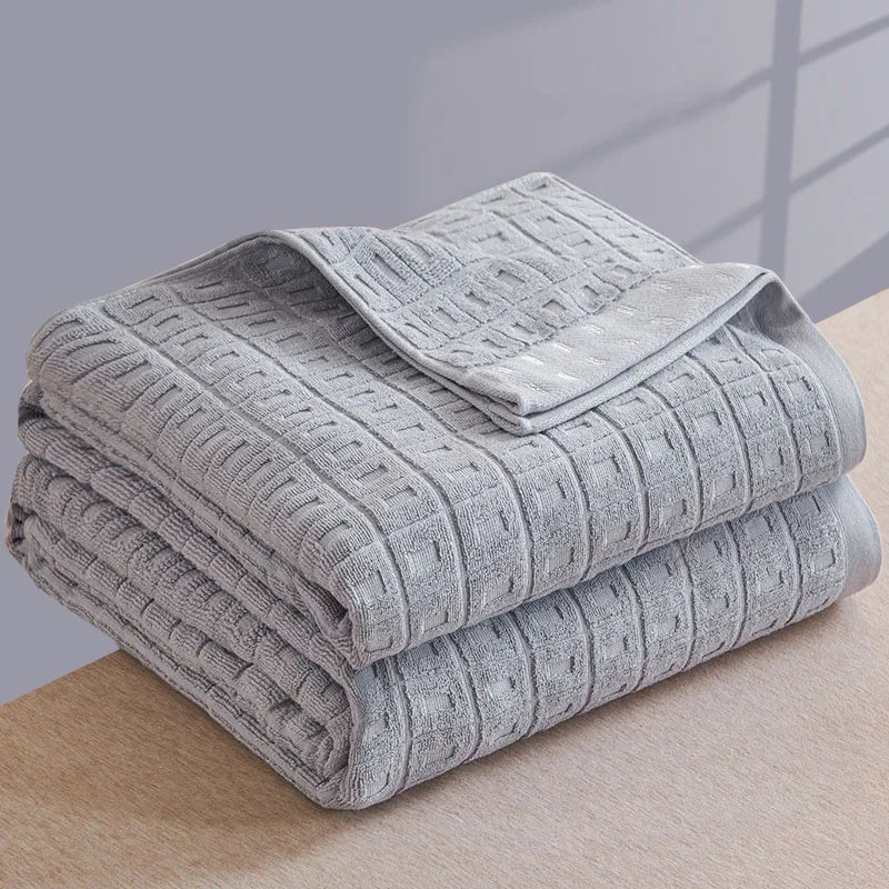 couverture coton bleu gris rose moderne plaid motifs carrés bordure texturée été hiver portable