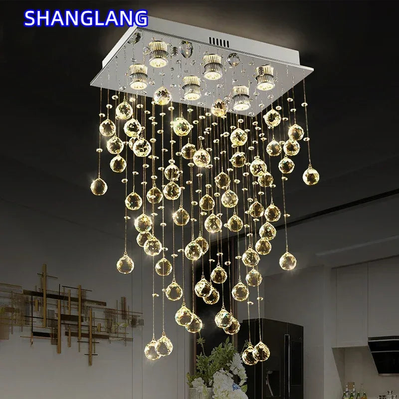 suspension lumineuse moderne transparente cristal brillantes élégante dorée fixations invisibles chaînes incluses