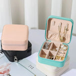 boîte bijoux cuir pu noir rose blanche bleue moderne compact glissière rangement bijoux