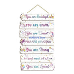 décoration murale plaquettes bois textes inspirants dinosaures papillons étoiles enfants