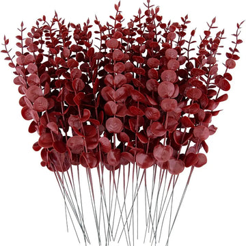 vase blanc moderne fleurs artificielles feuilles vertes décoration table intérieure