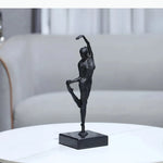 statuette ballerine moderne noire texturée socle deux livres fashion
