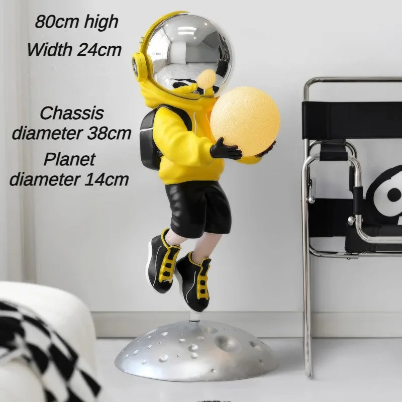 statuette astronaute résine couleur changeante doré argenté rose jaune moderne brillant métallique fixations