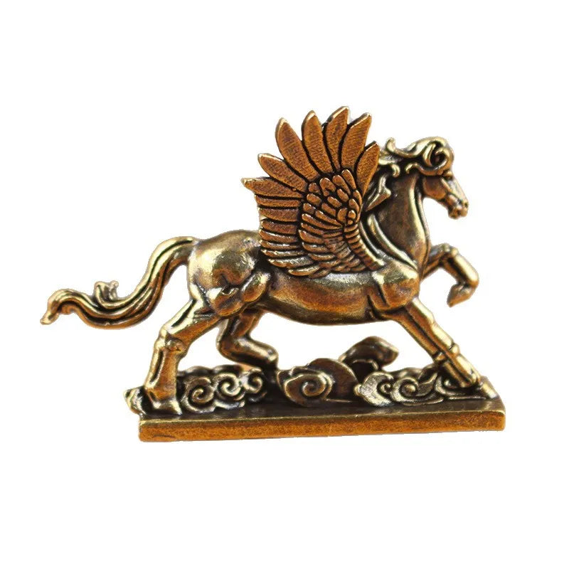 statuette cheval ailé bronze doré relief mythologique base ornée motifs ondulés decoratif aspect vieilli