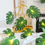 guirlande feuilles vertes led festives decoration feuille monstera lumiere jaune deco mur plantes artificielles