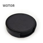 Porte-boissons ronds et noirs en cuir avec logo Wotor imprimé au centre.