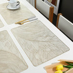 Set de table motif plume noir anti-brûlure vue de dessus