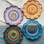 serviettes table crochet motif circulaire couleurs vives main d'oeuvre artisanale pastoral annuel arrière rouleau