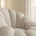 fauteuil moderne velours bouclé doux repos pieds beige clair intérieur meubles salon contemporain
