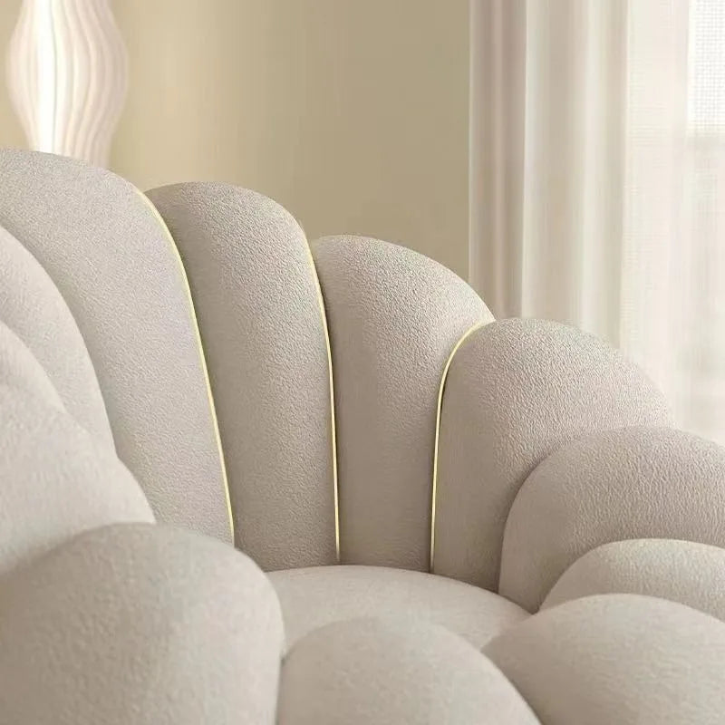 fauteuil moderne velours bouclé doux repos pieds beige clair intérieur meubles salon contemporain