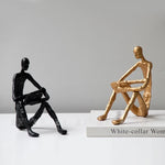 statuette moderne minimaliste or noir texture rugueuse stylisée acrobatie décoration pièce ornement figure