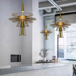 suspension lumineuse or noir contemporain minimaliste ampoule led intégrée fixation câbles métal superposé