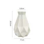 vase moderne plastique rose blanc motifs ondulés décoration florale artificielle table minimaliste