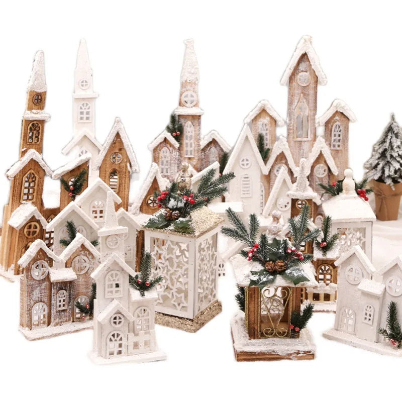 Château de Noël en bois placé sur une table de fête décorée