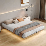 lit plateau bois moderne minimaliste sommier tapissé beige oreillers plaid géométrique tapis minimaliste
