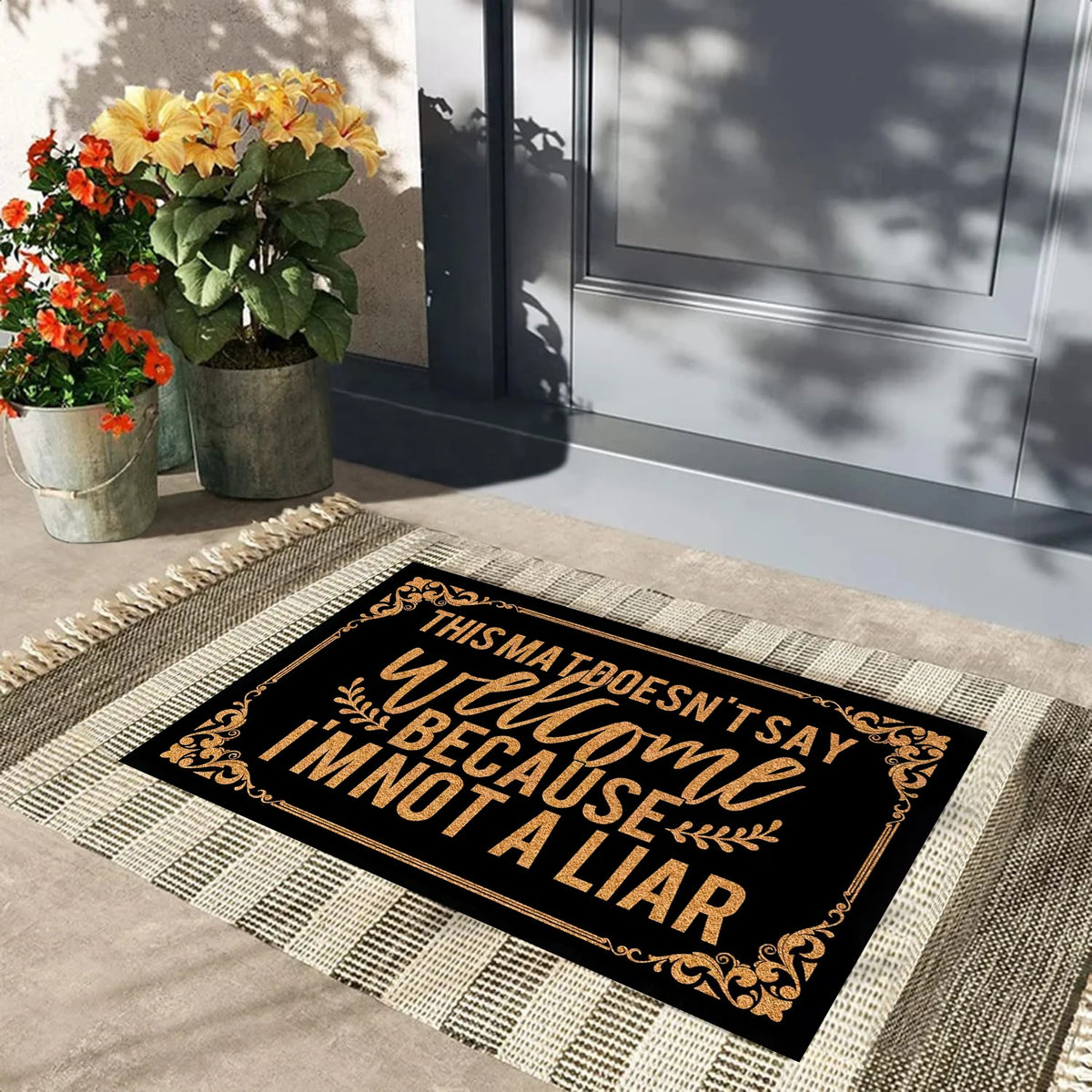 tapis d'entrée noir lettrage doré antidérapant résistant bactéries élégant extérieur porte sol