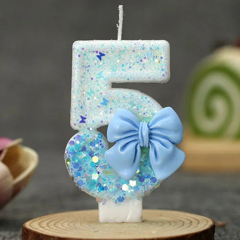 bougies anniversaire numérotées paillettes blanches bleues décoratives festives tringle nœud