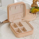 boîte bijoux simili cuir zippée compartiments moderne vert rose beige noir