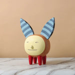 figurines decoratives modernes enfants couleurs vives motifs points textures lisses deco maison exposition