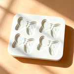 moule silicone nœuds papillons pâtisserie décorative couleurs variées fondant cupcakes