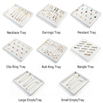 présentoir bijoux cuir classique or argent pierres précieuses clips rangement boîte plateau