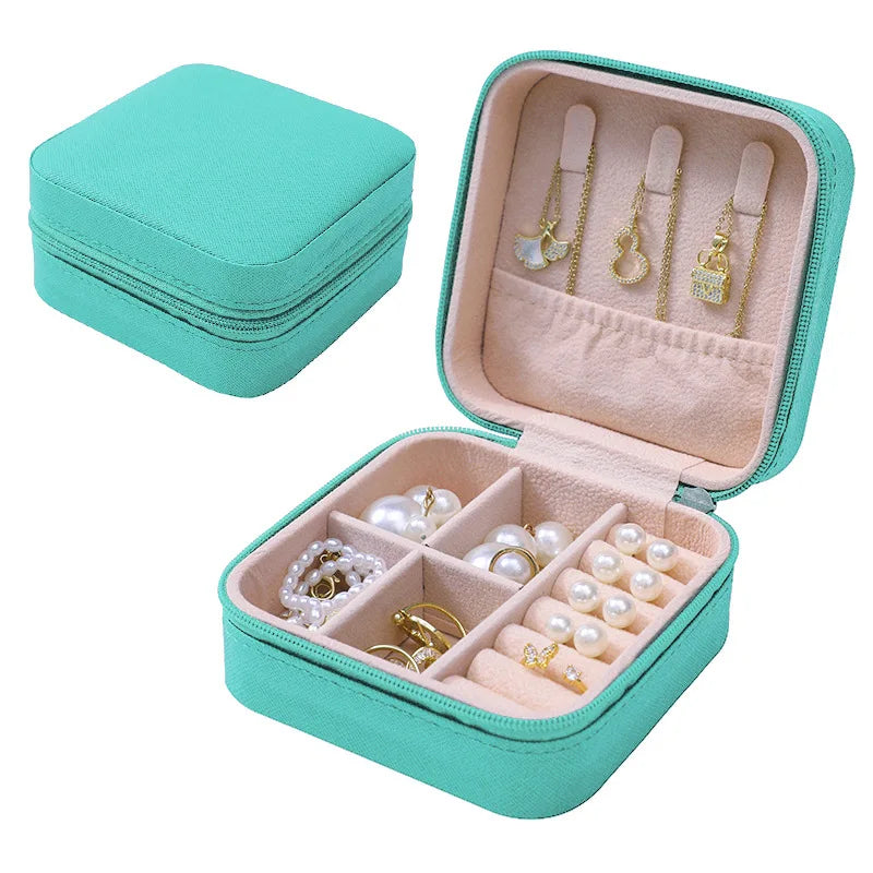 boîte bijoux simili cuir vert pastel moderne fermeture glissière blanc rose pâle boucles doreilles
