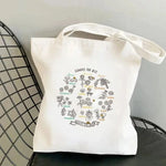 sac main toile imprimé floral blanc doux moderne poignées détachables poche ouverte sans compartiments