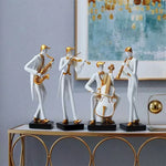 statues musiciens résine blanc doré moderne minimaliste saxophone violoncelle décoration
