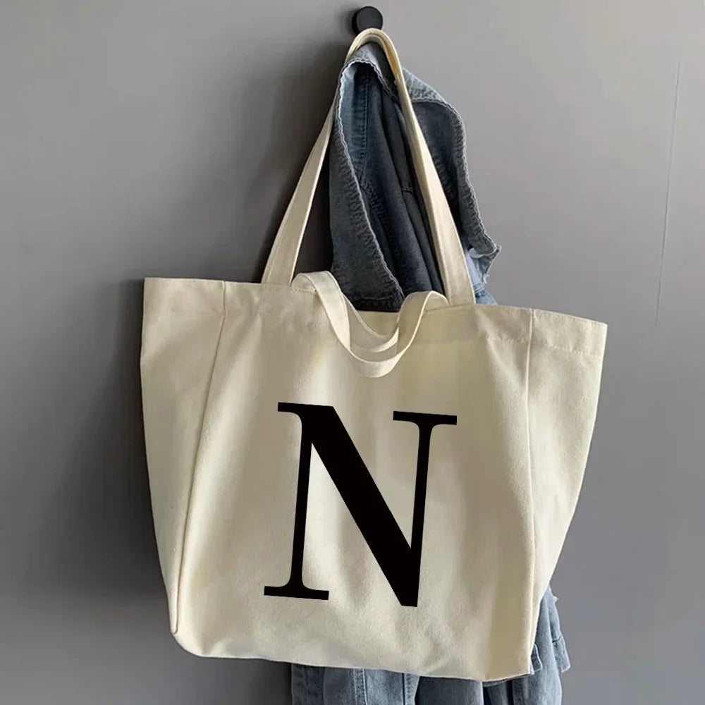 sac main femme toile beige clair lettre noire poignées détachables