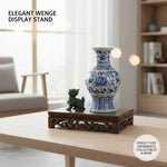 support d'affichage bois marron foncé ornements sculptés classique élégant texture naturelle décoration intérieure vase