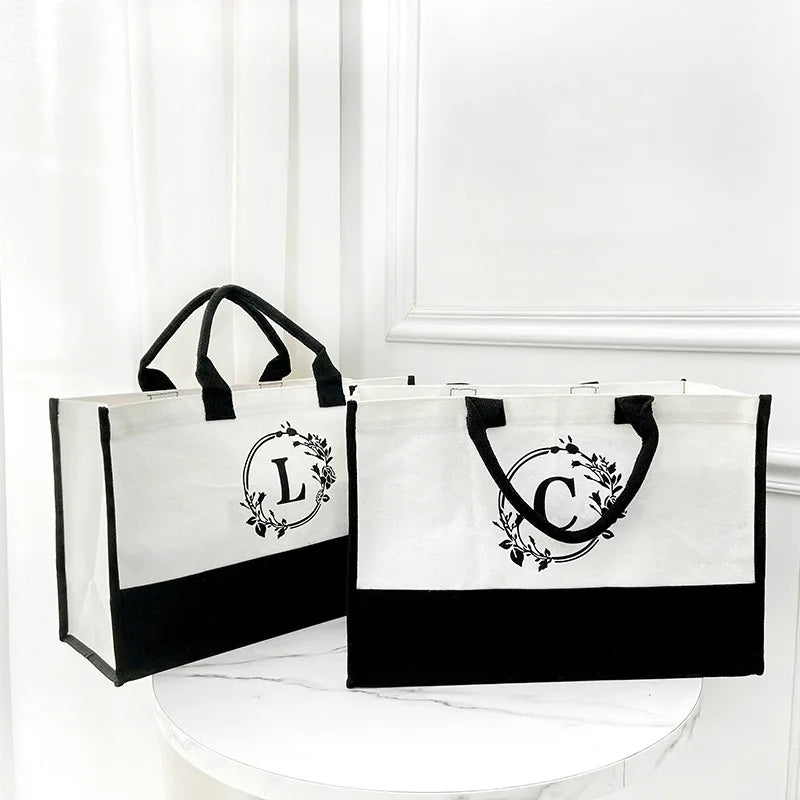 sac main toile blanc noir personnalisable logo respectueux environnement multifonctionnel moderne minimaliste poignées détachables