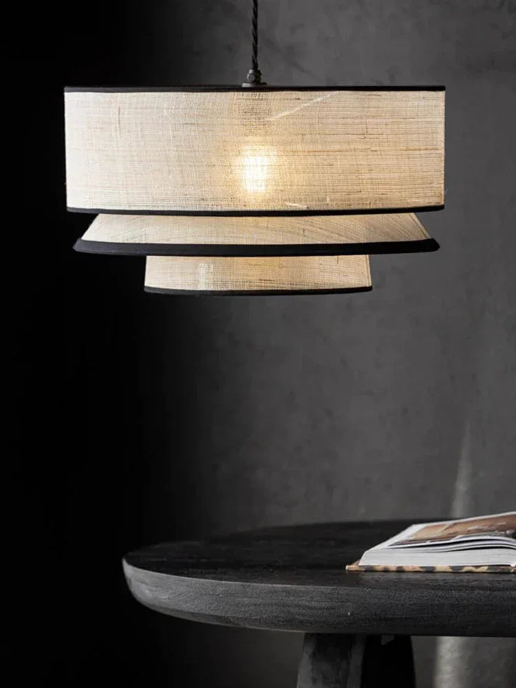 lumière suspendue tissu beige clair texture moderne opacité câble blanc chambre salon