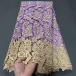 dentelle acrylique brodée motifs floraux opaques vert beige jaune violet bleu tissu filet jacinthe