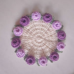 coussin crocheté motif floral artisanal couleur rouge rose orange jaune violet