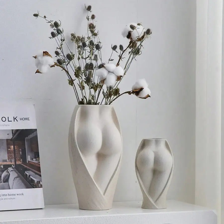 vases céramique modernes blancs fleurs séchées décoration table salon humains stylisés minimaliste