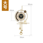 horloge murale moderne or blanc silhouette cerf éléments suspendus abstrait géométrique