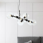 Suspension lumineuse moderne sphères transparentes dorées structure métallique noir chambre salon