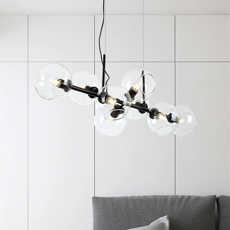 Suspension lumineuse moderne sphères transparentes dorées structure métallique noir chambre salon