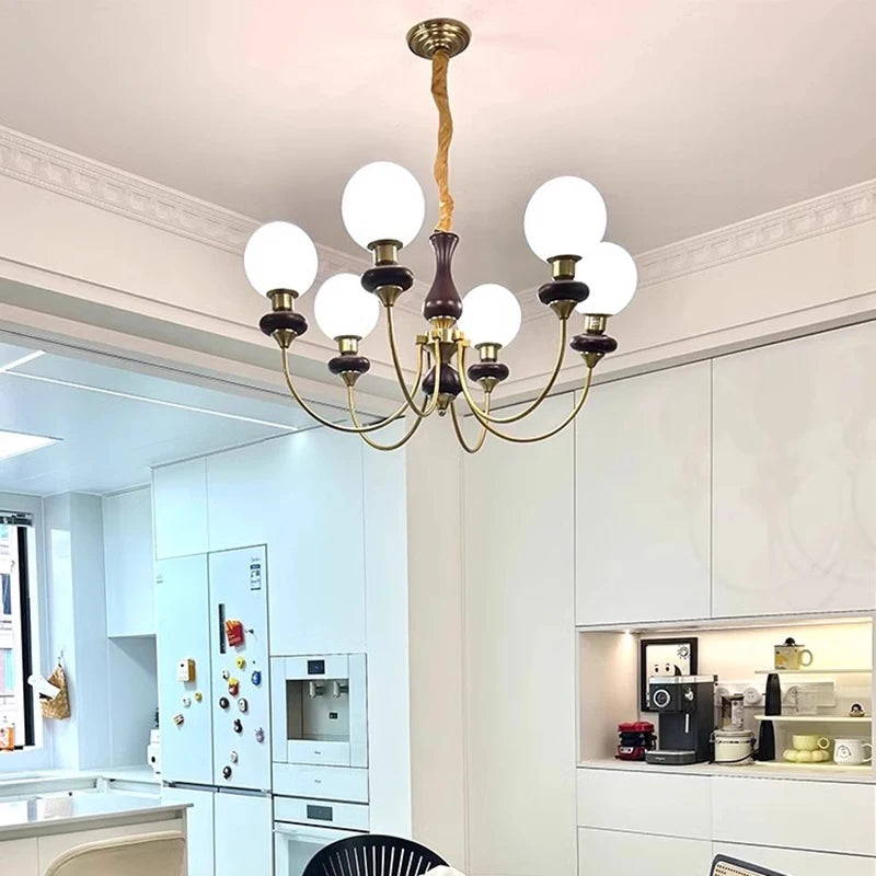 lustre classique doré noir sphères translucides structure métallique led salon chambrehôtel