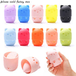 pot savon silicone rose bleu violet animalier brosse nettoyage intégrée texture douce patte chat