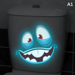 stickers toilette visage souriant yeux grands ouverts cartoon lumineux adhésifs salle bain bleu blanc