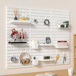 panneau rangement perforé blanc moderne fixation murale porte clés cache câbles support plante horloge