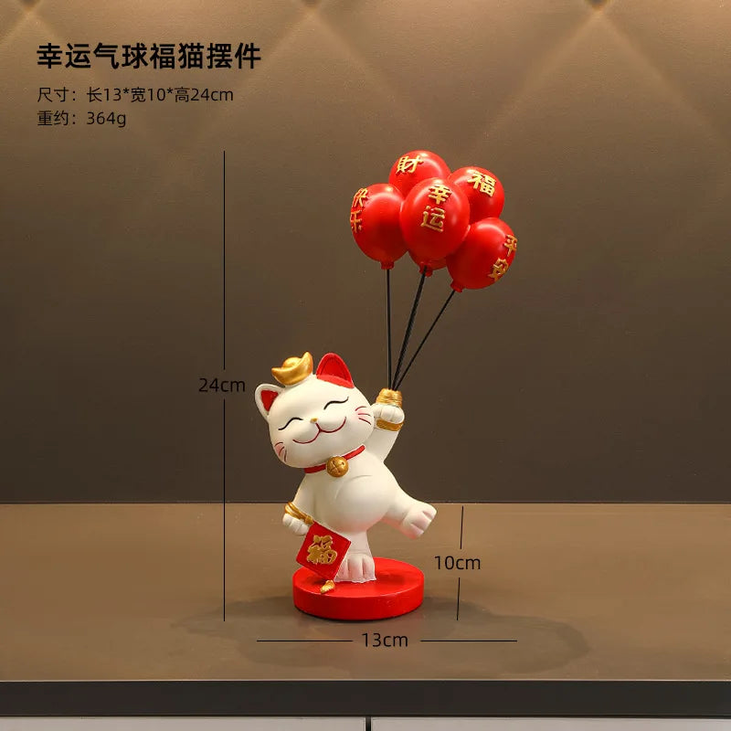 statue chat porte bonheur blanc doré artisanal détails dorés pochette rouge plateau texte rouge