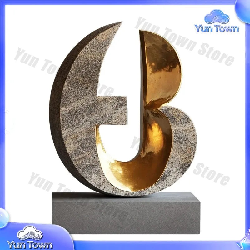 sculptures décoratives abstraites modernes or bronze marron surfaces polies aspect texturé rouille base pierre