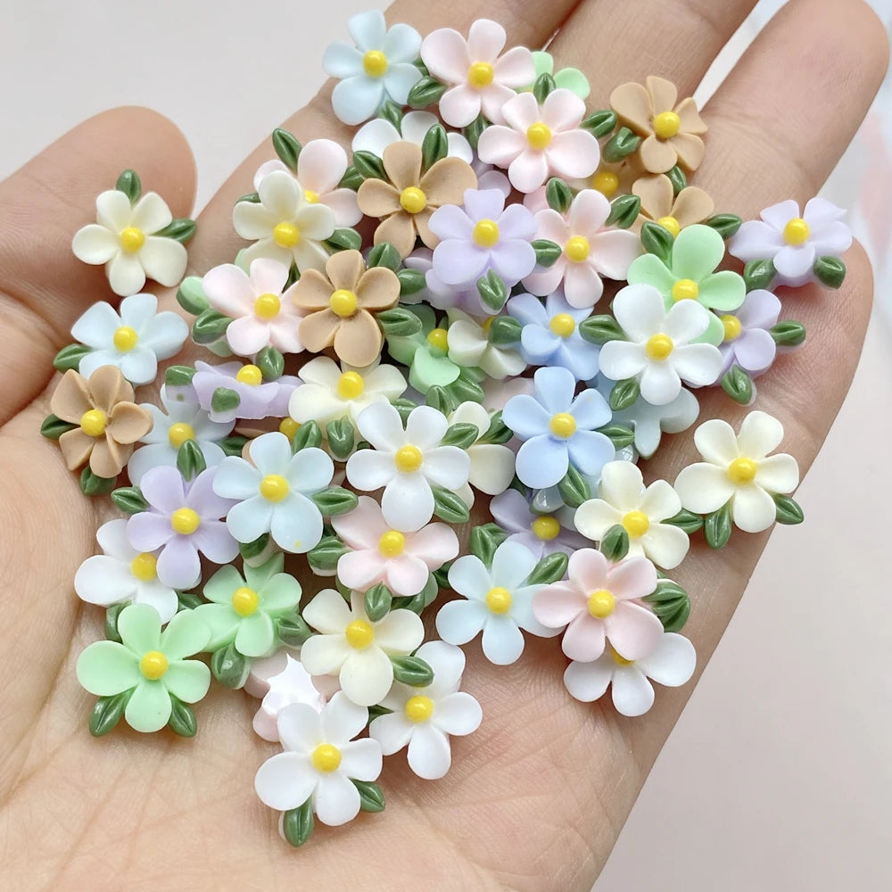 bijoux décoration ongles nail art fleurs colorées résine minimalistes blanc rose bleu vert jaune