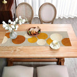 nappe table motif géométrique moderne beige orange blanc tissu lin facile nettoyage cuisine salle