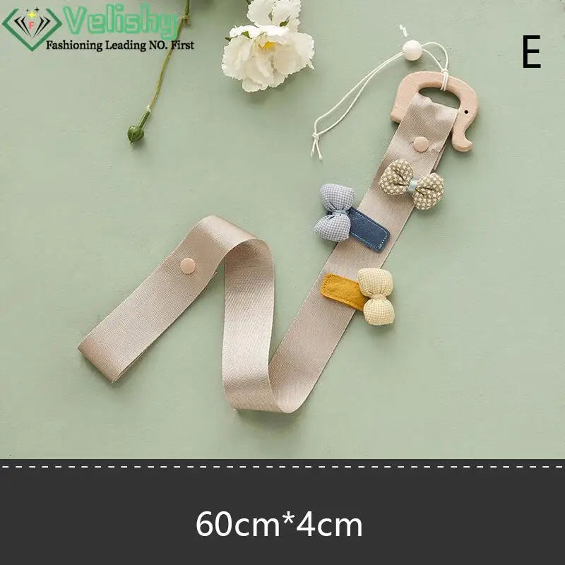 porte accessoires mural moderne rubans clips cheveux motifs floraux pois arc ciel nuages papillons
