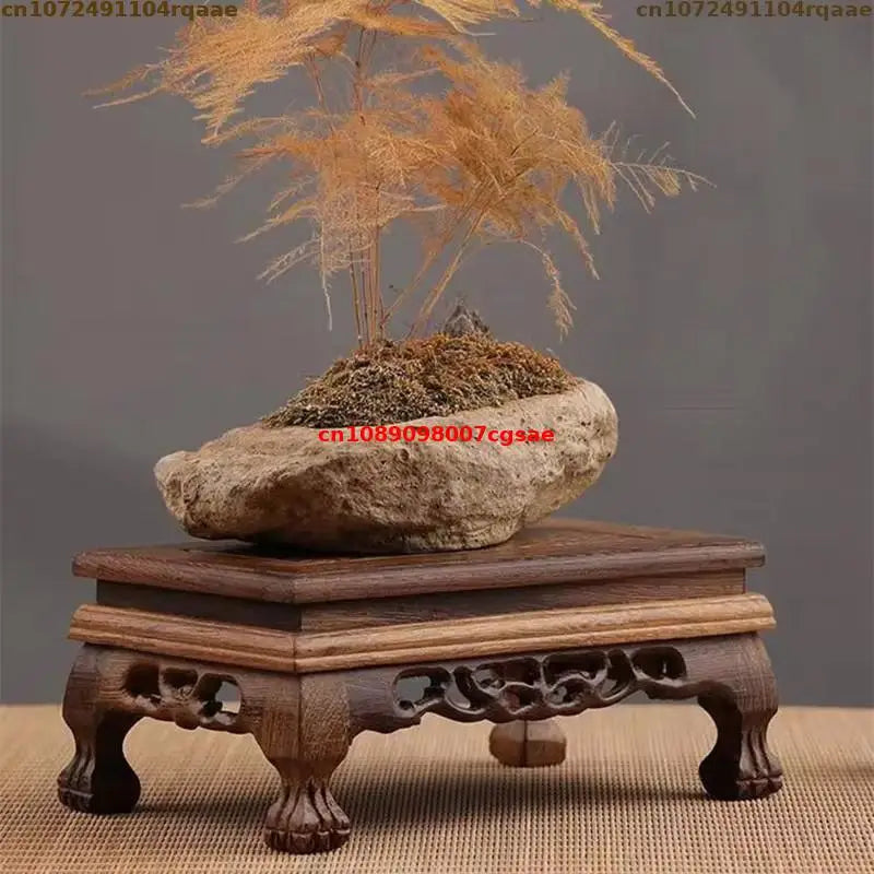 support bois marron gravures détaillées classique artisanal table décoration maison objets trépied plantes intérieures