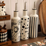 bouteilles cuisine céramique blanc noir rayures fleurs moderne assaisonnement huile épices stockage respectueux environnement
